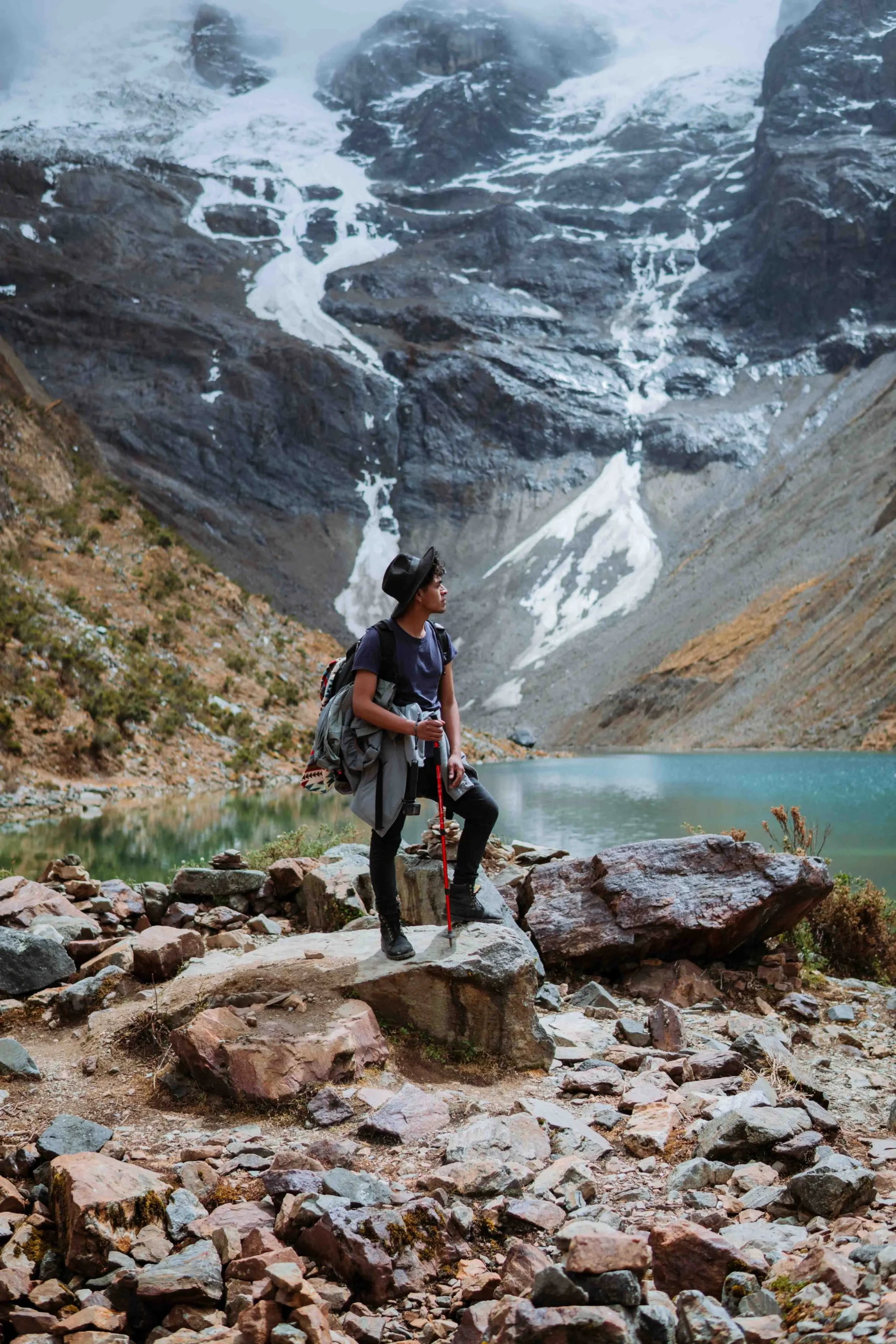 Hiker enjoying the scenic viewpoint at Humantay Lake